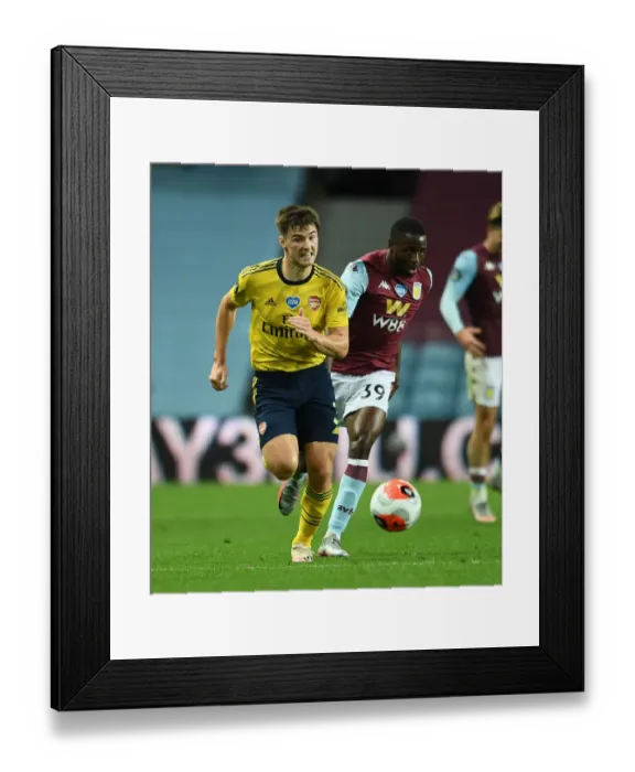 Framed Print : Clash at Villa Park: Kieran Tierney Faces Keinan Davis in Intense Aston Villa vs. Arsenal FC Showdown (Premier League 2019-20)