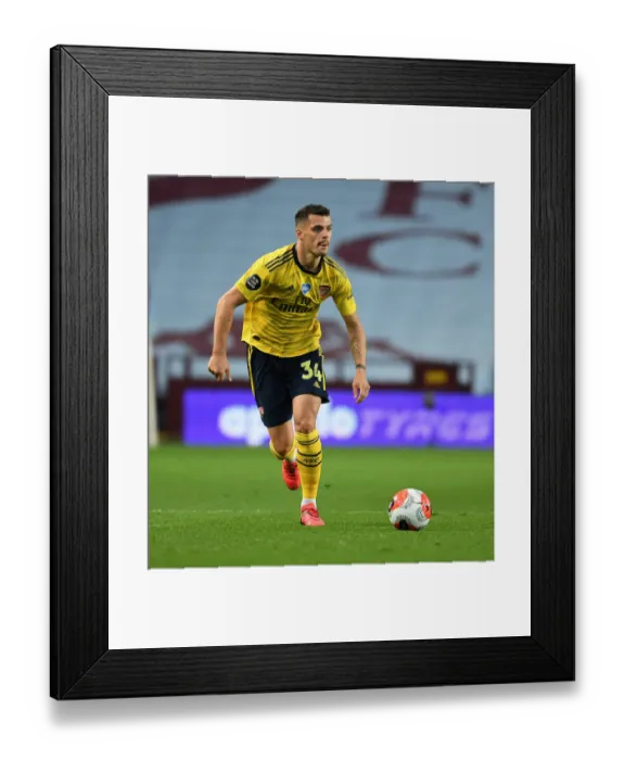 Framed Print : Granit Xhaka in Action: Aston Villa vs. Arsenal, Premier League 2019-2020