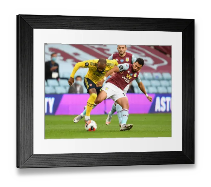 Framed Print : Clash at Villa Park: Lacazette vs. Trezeguet in Intense Aston Villa vs. Arsenal FC Premier League Showdown