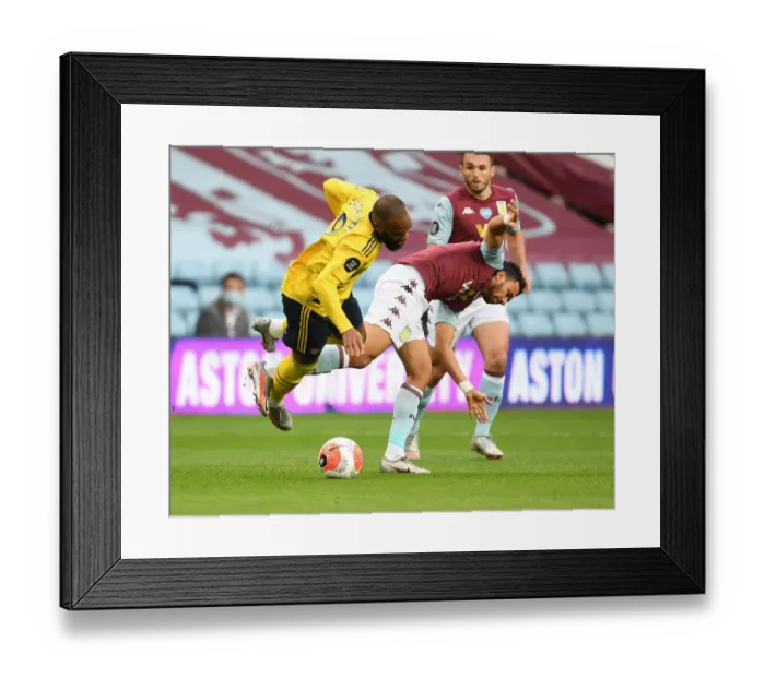 Framed Print : Lacazette vs. Trezeguet: A Premier League Clash at Villa Park