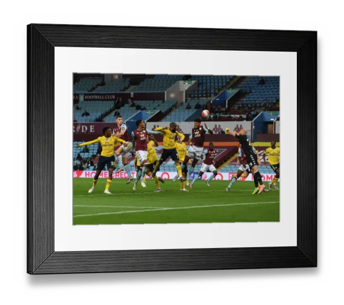 Framed Print : Clash at Villa Park: Lacazette vs. Mings in Premier League Showdown (Aston Villa vs. Arsenal, 2019-20)