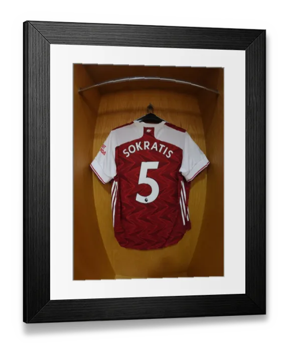 Framed Print : Arsenal FC: Sokratis Jersey Hangs in Emirates Stadium Changing Room Ahead of Arsenal v Watford Match (2019-2020)
