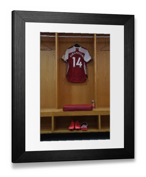Framed Print : Arsenal FC: Pierre-Emerick Aubameyang's Home Jersey in the Changing Room before Arsenal v Watford (2019-20) Framed Print : Arsenal FC: Pierre-Emerick Aubameyang's Home Jersey in the Changing Room before Arsenal v Watford (2019-20)