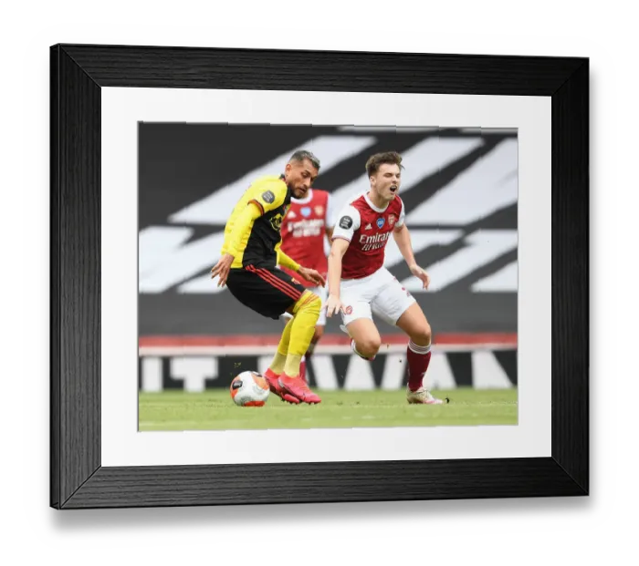 Framed Print : Arsenal's Tierney vs. Pereyra: A Fierce Rivalry Unfolds in the Arsenal vs. Watford Clash