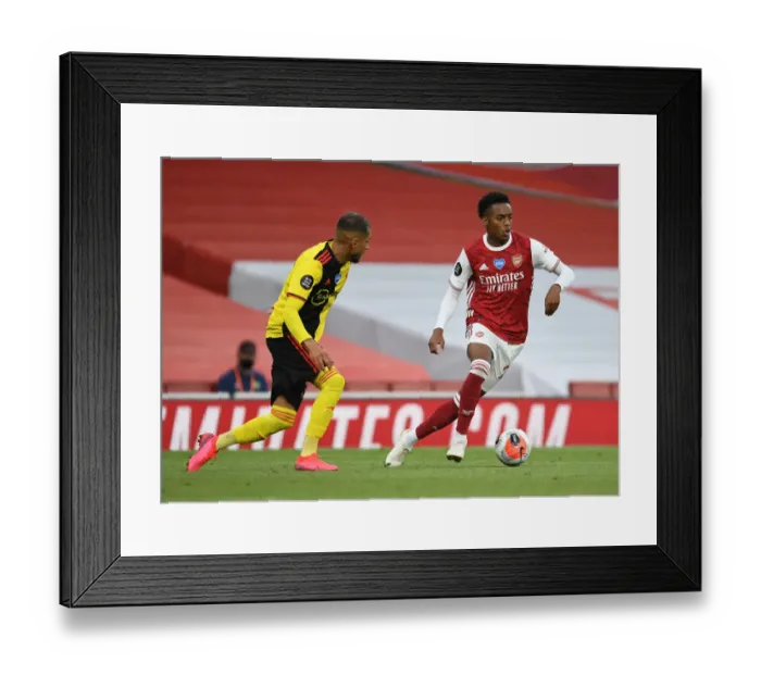 Framed Print : Arsenal's Joe Willock Outsmarts Roberto Pereyra: A Premier League Masterclass at Emirates Stadium Framed Print : Arsenal's Joe Willock Outsmarts Roberto Pereyra: A Premier League Masterclass at Emirates Stadium