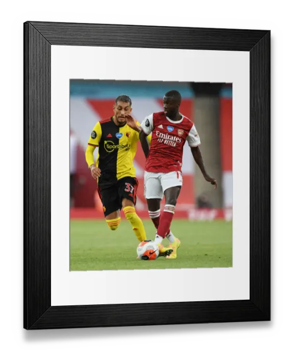 Framed Print : Pepe's Magic: Arsenal's Winger Outwits Pereyra in Premier League Clash