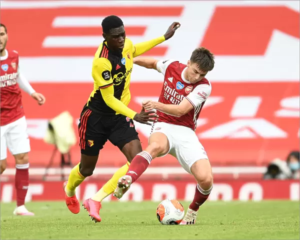 Arsenal's Kieran Tierney Clashes with Watford's Ismaila Sarr in Premier League Showdown