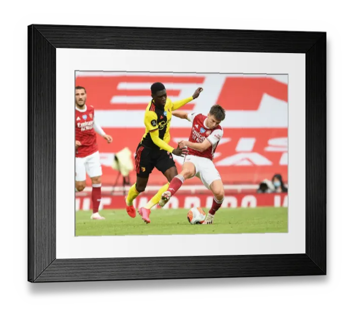 Framed Print : Arsenal's Kieran Tierney Clashes with Watford's Ismaila Sarr in Premier League Showdown Framed Print : Arsenal's Kieran Tierney Clashes with Watford's Ismaila Sarr in Premier League Showdown