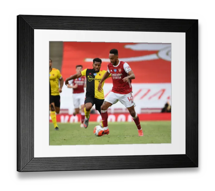 Framed Print : Arsenal's Aubameyang Scores Past Mariappa in Arsenal vs. Watford (2019-20)