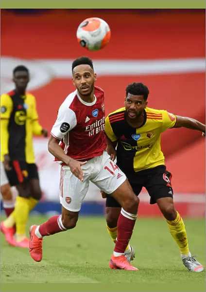 Arsenal's Aubameyang Clashes with Watford's Mariappa in Premier League Showdown
