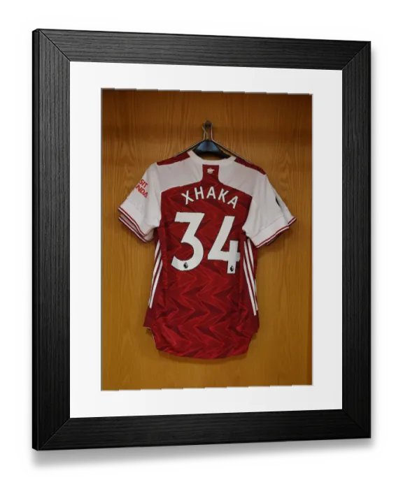 Framed Print : Arsenal FC: Granit Xhaka's Jersey Hangs in Emirates Stadium Changing Room Ahead of Arsenal v Watford Match (2019-20)