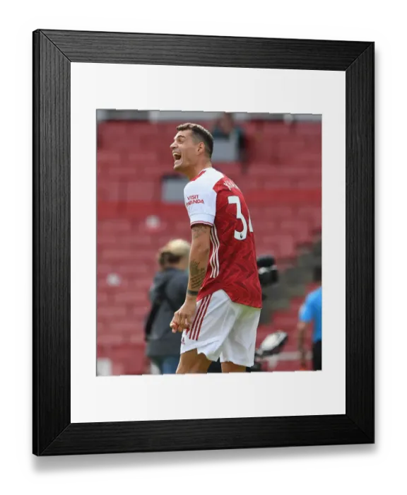 Framed Print : Arsenal's Granit Xhaka Gears Up for Arsenal v Watford Premier League Clash (2019-20) Framed Print : Arsenal's Granit Xhaka Gears Up for Arsenal v Watford Premier League Clash (2019-20)