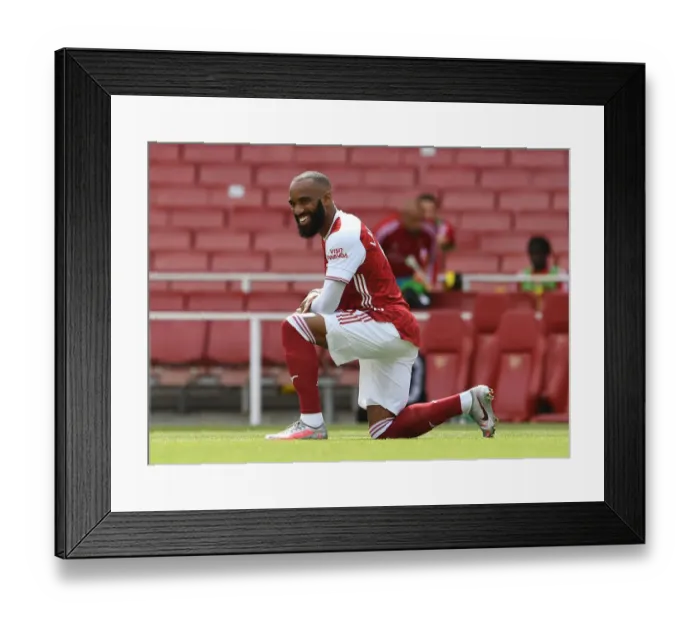 Framed Print : Arsenal's Alexandre Lacazette Takes a Knee During Arsenal v Watford Premier League Match Framed Print : Arsenal's Alexandre Lacazette Takes a Knee During Arsenal v Watford Premier League Match