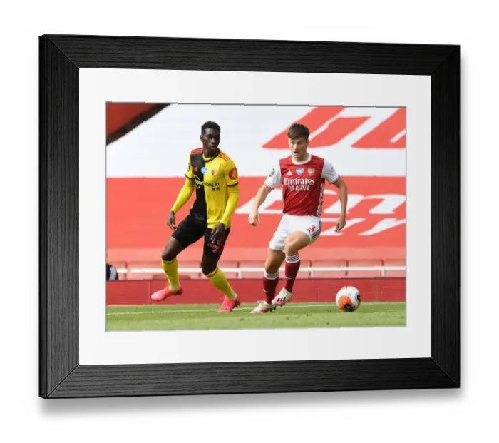 Framed Print : Arsenal's Kieran Tierney Clashes with Ismaila Sarr in Intense Premier League Face-off Framed Print : Arsenal's Kieran Tierney Clashes with Ismaila Sarr in Intense Premier League Face-off