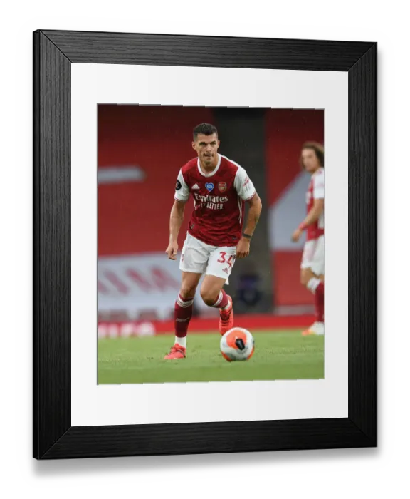Framed Print : Granit Xhaka: Arsenal's Midfield Maestro in Action Against Watford, Premier League 2019-2020 Framed Print : Granit Xhaka: Arsenal's Midfield Maestro in Action Against Watford, Premier League 2019-2020