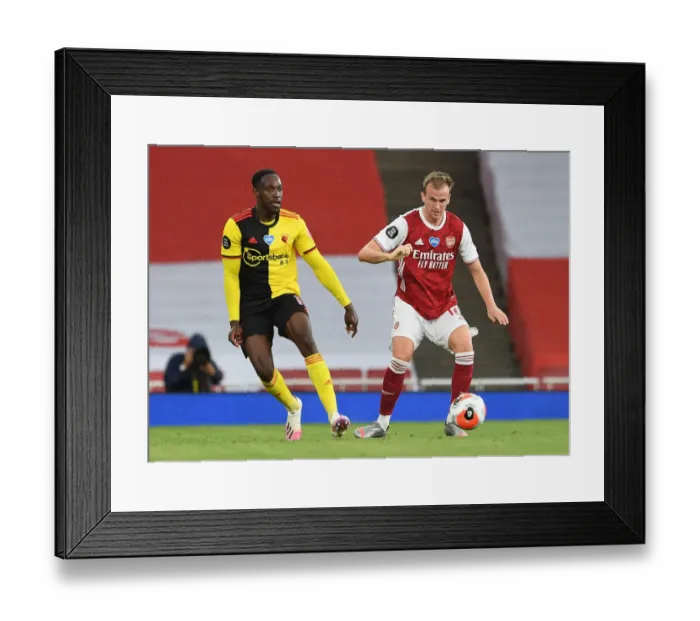 Framed Print : Arsenal FC vs Watford FC: Intense Moment Between Danny Welbeck and Rob Holding at Emirates Stadium
