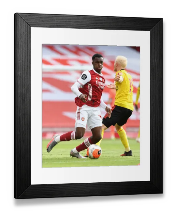 Framed Print : Arsenal's Nketiah vs. Hughes: Intense Face-Off in Arsenal vs. Watford Clash Framed Print : Arsenal's Nketiah vs. Hughes: Intense Face-Off in Arsenal vs. Watford Clash