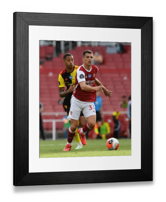 Framed Print : Arsenal's Xhaka Clashes with Watford's Joao Pedro in Premier League Showdown Framed Print : Arsenal's Xhaka Clashes with Watford's Joao Pedro in Premier League Showdown