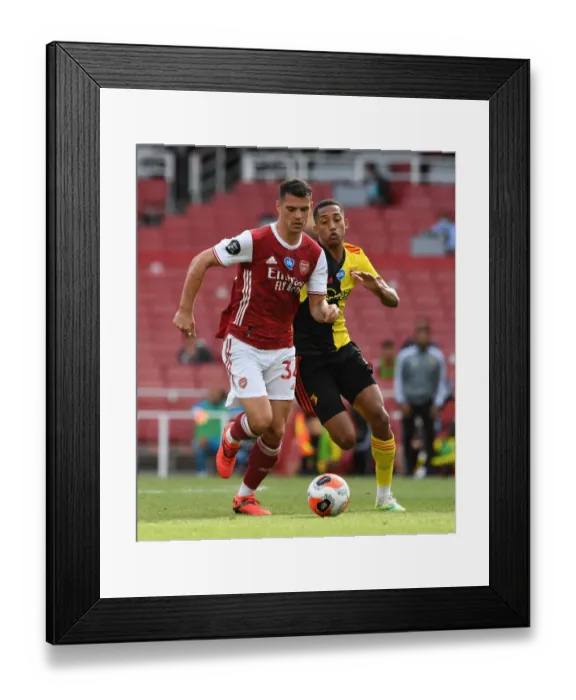 Framed Print : Xhaka vs. Pedro: A Battle of Midfield Titans in Arsenal's Premier League Clash