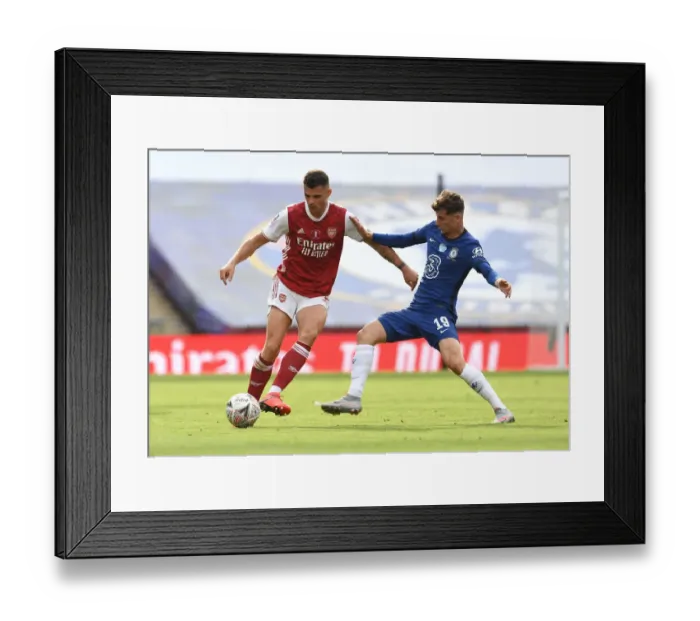 Framed Print : FA Cup Final 2020: Empty Wembley Showdown - Xhaka vs. Mount: Arsenal vs. Chelsea Clash Amidst Pandemic Framed Print : FA Cup Final 2020: Empty Wembley Showdown - Xhaka vs. Mount: Arsenal vs. Chelsea Clash Amidst Pandemic