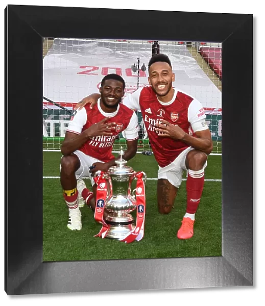 Arsenal's Empty FA Cup Victory: Maitland-Niles and Aubameyang Celebrate at Deserted Wembley (2020)