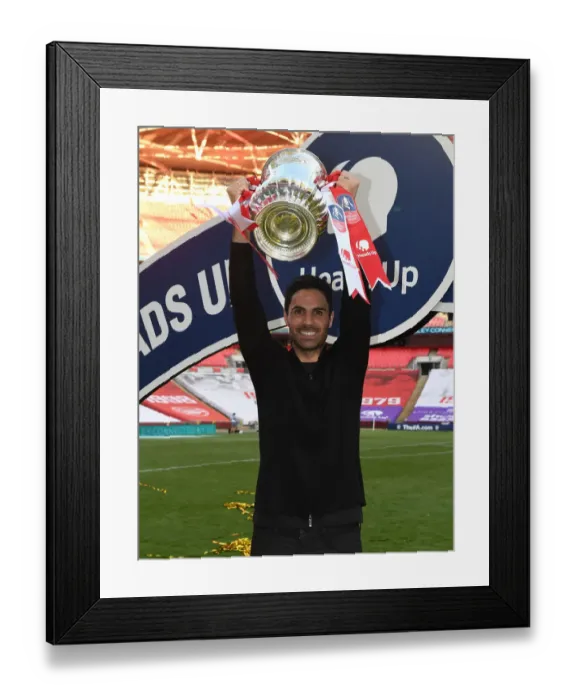 Framed Print : Arsenal's Mikel Arteta Lifts FA Cup After Empty-stadium Victory over Chelsea Framed Print : Arsenal's Mikel Arteta Lifts FA Cup After Empty-stadium Victory over Chelsea