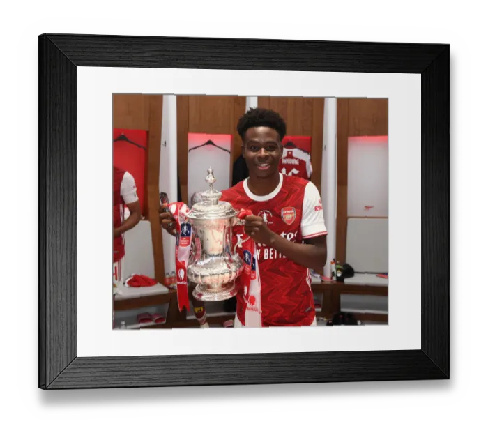 Framed Print : Arsenal's Bukayo Saka Celebrates FA Cup Victory: Arsenal v Chelsea, FA Cup Final 2020 (Empty Wembley) Framed Print : Arsenal's Bukayo Saka Celebrates FA Cup Victory: Arsenal v Chelsea, FA Cup Final 2020 (Empty Wembley)