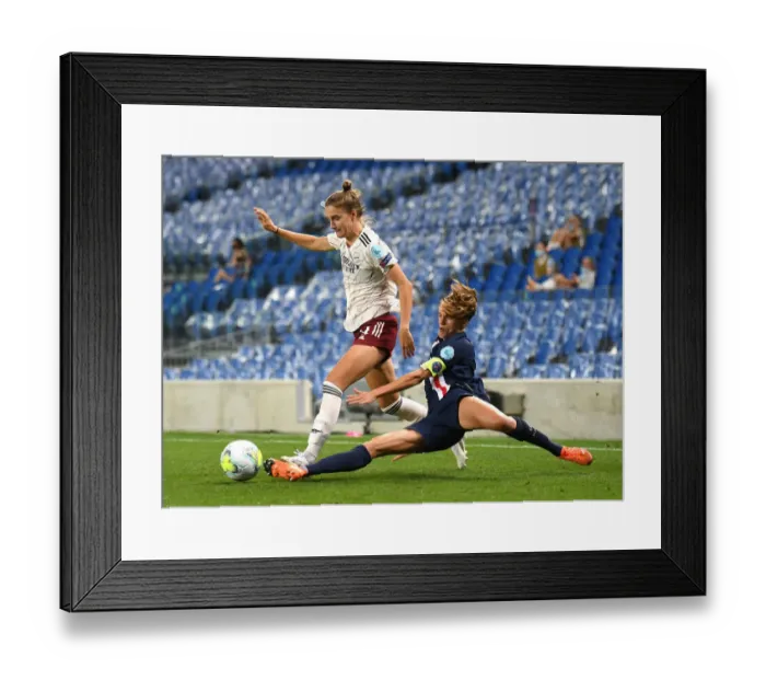 Framed Print : Miedema vs. Paredes: A Champions League Showdown - Arsenal's Star Forwards Clash in Quarterfinals