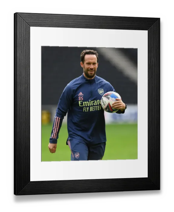 Framed Print : Arsenal's Barry Solan Prepares Squad for MK Dons Friendly