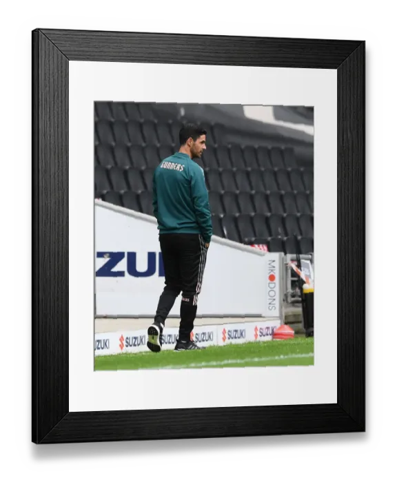 Framed Print : Arsenal's Mikel Arteta Leads Team in Pre-Season Friendly Against MK Dons Framed Print : Arsenal's Mikel Arteta Leads Team in Pre-Season Friendly Against MK Dons