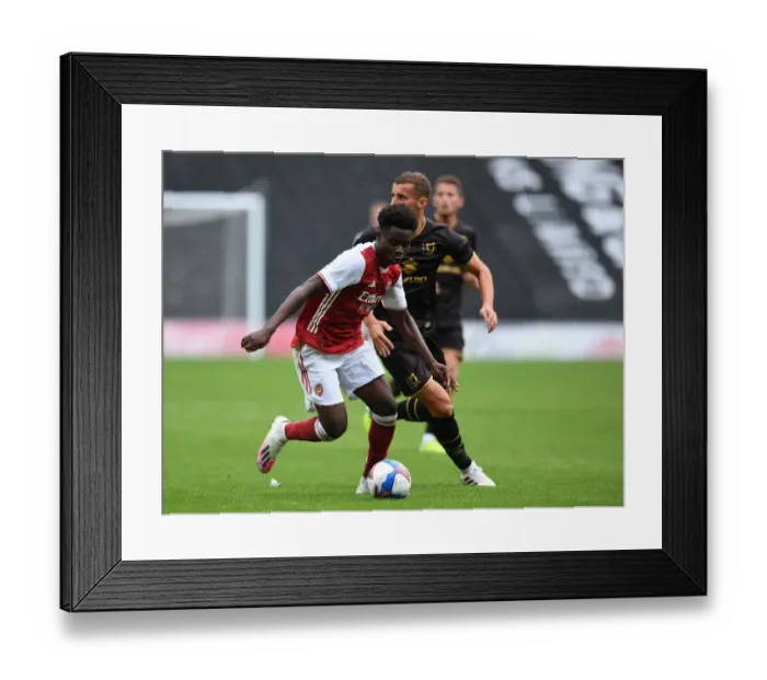 Framed Print : Bukayo Saka's Brilliant Performance: Arsenal Takes Pre-Season Victory Over MK Dons Framed Print : Bukayo Saka's Brilliant Performance: Arsenal Takes Pre-Season Victory Over MK Dons