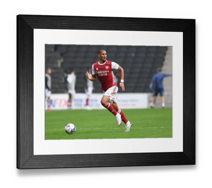 Framed Print : William Saliba's Debut Shines: Arsenal's Pre-Season Victory Over MK Dons