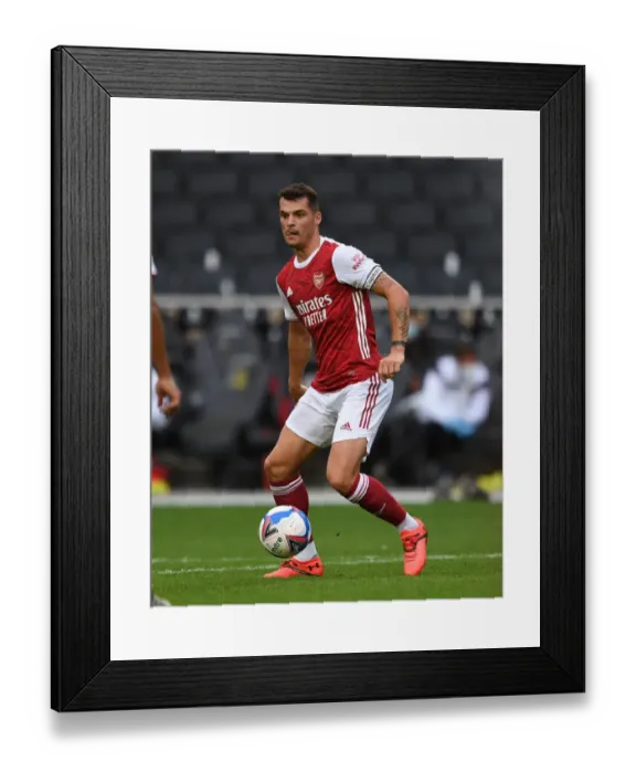 Framed Print : Granit Xhaka's Dominance: Arsenal's Pre-Season Victory over MK Dons (2020-21)