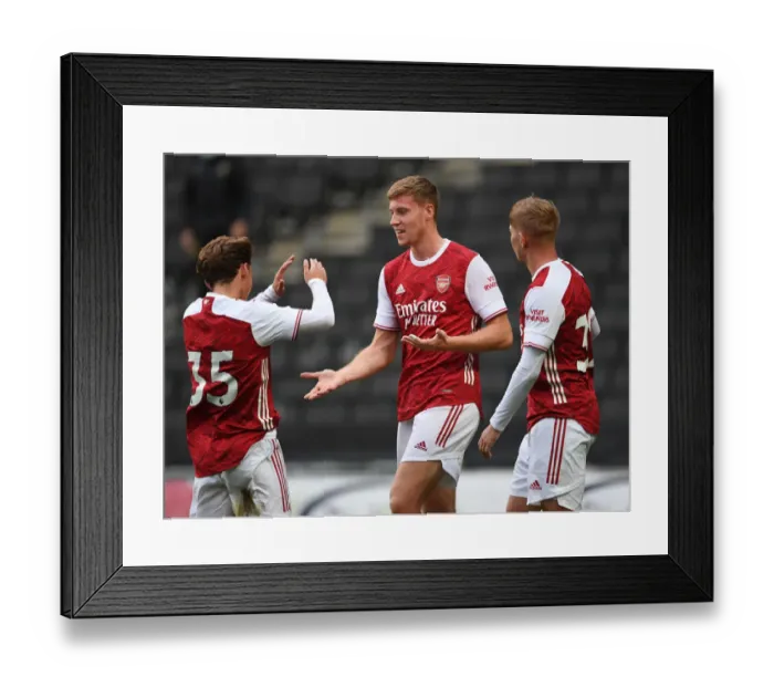 Framed Print : McGuinness Scores as Arsenal Secure Pre-Season Victory over MK Dons