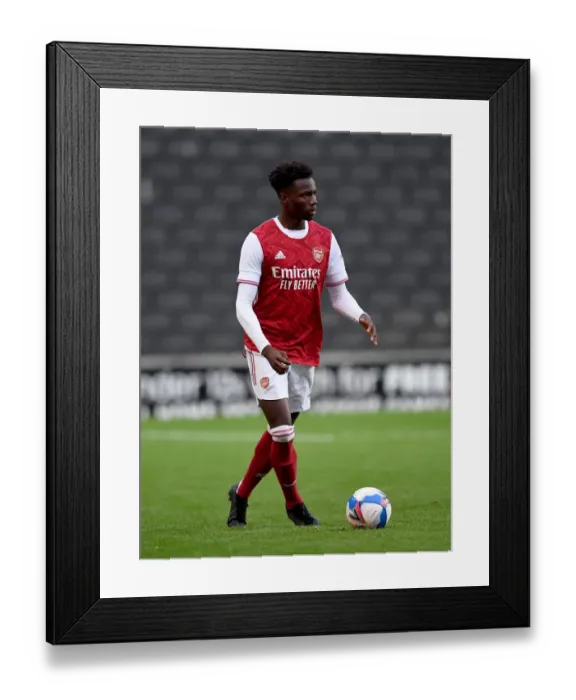 Framed Print : Arsenal's Daniel Oyegoke in Action at MK Dons Pre-Season Friendly, August 2020