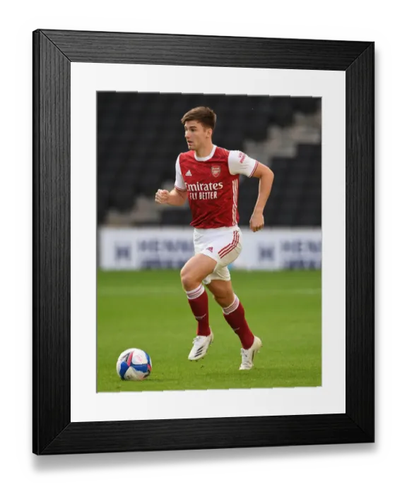Framed Print : Arsenal's Kieran Tierney in Action: Arsenal vs MK Dons (2020-21)