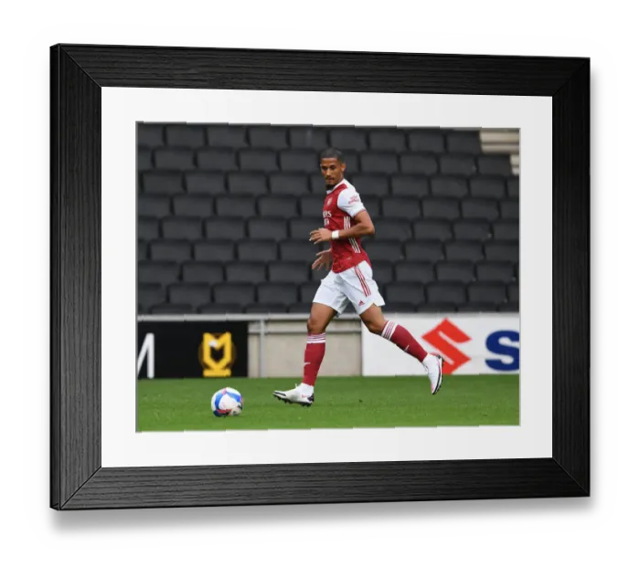 Framed Print : Arsenal's William Saliba Shines in MK Dons Pre-Season Friendly Framed Print : Arsenal's William Saliba Shines in MK Dons Pre-Season Friendly