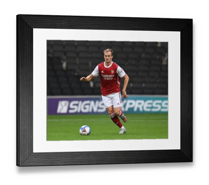 Framed Print : Rob Holding in Action: Arsenal's Pre-Season Battle against MK Dons, 2020
