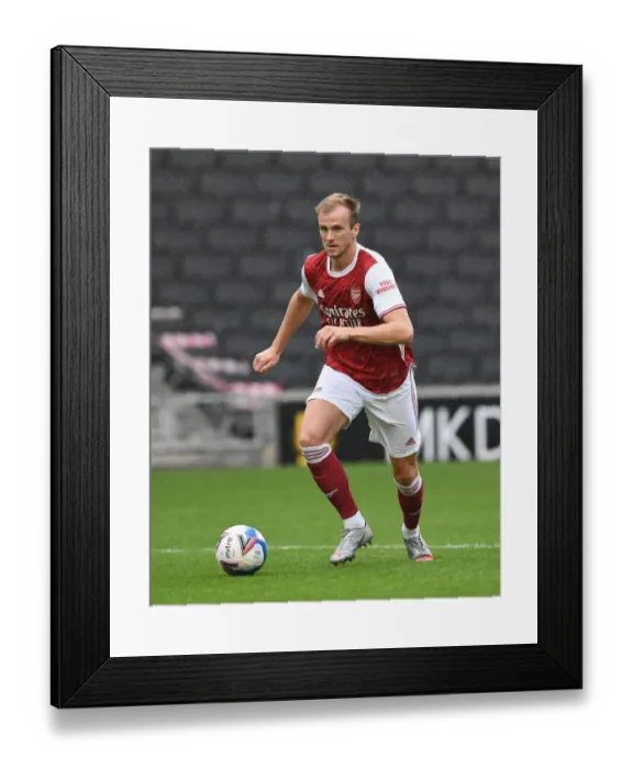 Framed Print : Arsenal's Rob Holding in Pre-Season Action Against MK Dons Framed Print : Arsenal's Rob Holding in Pre-Season Action Against MK Dons