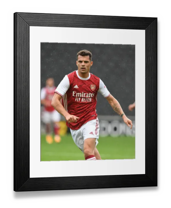 Framed Print : Granit Xhaka's Pre-Season Glory: Arsenal's Victory over MK Dons, 2020
