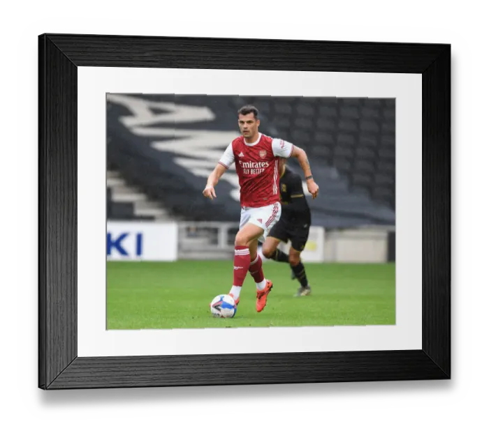 Framed Print : Granit Xhaka's Pre-Season Dominance: Arsenal's Victory over MK Dons, 2020 Framed Print : Granit Xhaka's Pre-Season Dominance: Arsenal's Victory over MK Dons, 2020