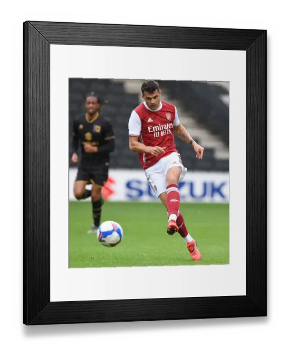 Framed Print : Granit Xhaka's Pre-Season Dominance: Arsenal's Victory over MK Dons, 2020 Framed Print : Granit Xhaka's Pre-Season Dominance: Arsenal's Victory over MK Dons, 2020