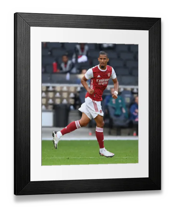 Framed Print : Arsenal's William Saliba Shines in Pre-Season Friendly against MK Dons