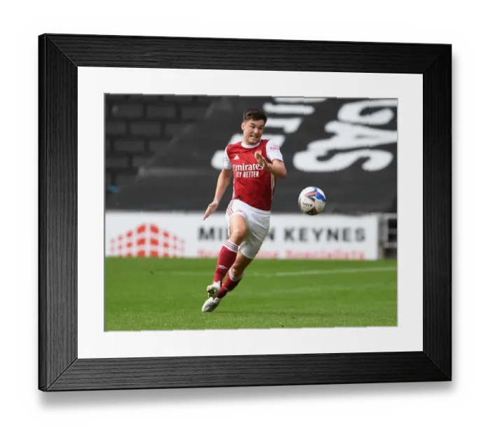 Framed Print : Arsenal's Kieran Tierney in Action: MK Dons Pre-Season Clash