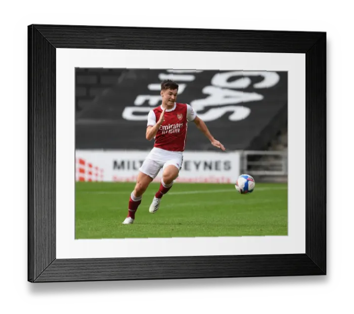 Framed Print : Arsenal's Kieran Tierney in Action: MK Dons Pre-Season Clash