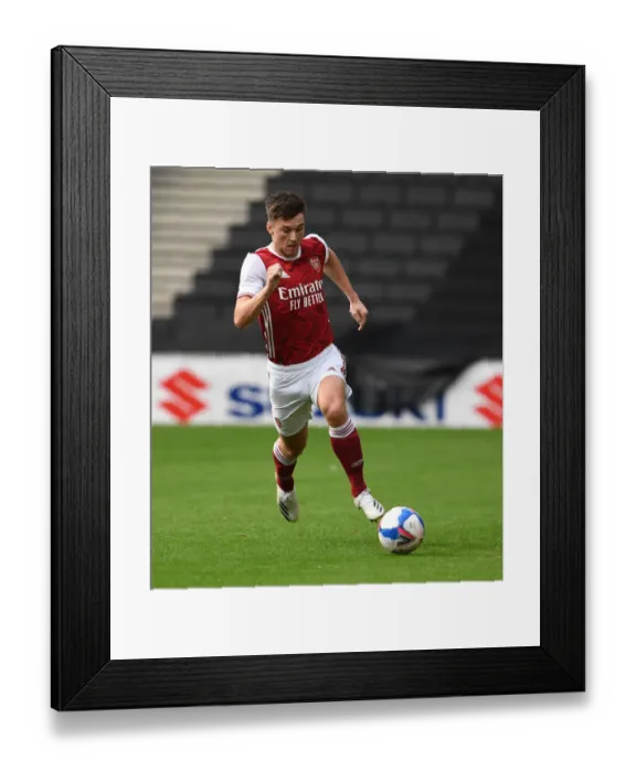 Framed Print : Arsenal's Kieran Tierney in Pre-Season Action against MK Dons Framed Print : Arsenal's Kieran Tierney in Pre-Season Action against MK Dons