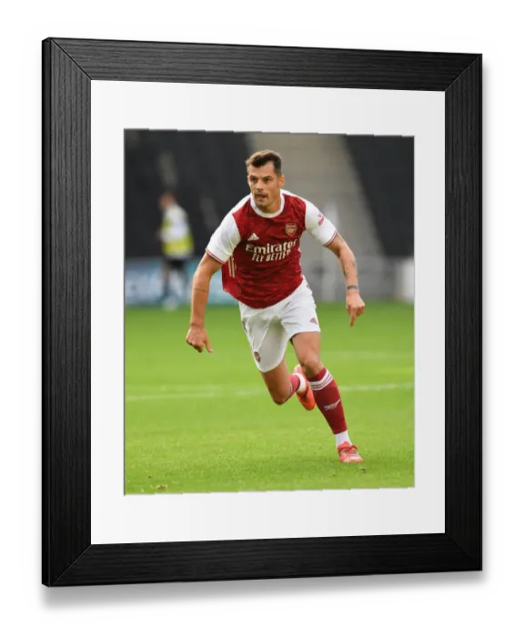 Framed Print : Granit Xhaka in Action: Arsenal vs MK Dons Pre-Season Friendly, 2020