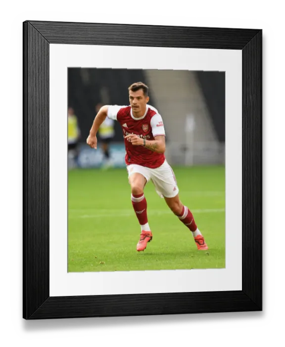 Framed Print : Granit Xhaka's Pre-Season Dominance: Arsenal's Victory over MK Dons (2020-21) Framed Print : Granit Xhaka's Pre-Season Dominance: Arsenal's Victory over MK Dons (2020-21)
