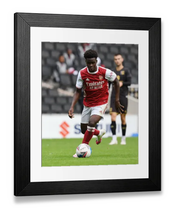 Framed Print : Arsenal's Bukayo Saka in Action: MK Dons Pre-Season Friendly (2020-21) Framed Print : Arsenal's Bukayo Saka in Action: MK Dons Pre-Season Friendly (2020-21)