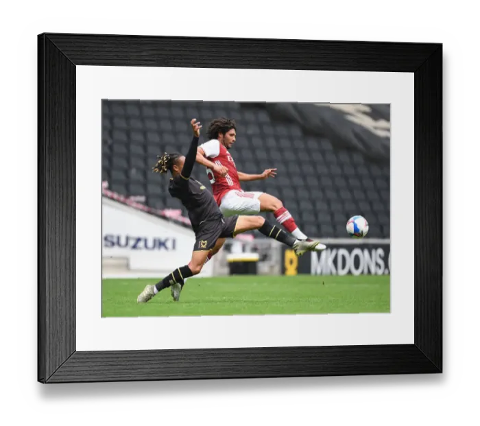 Framed Print : Arsenal's Mo Elneny Faces Off Against MK Dons David Kasumu in Pre-Season Friendly